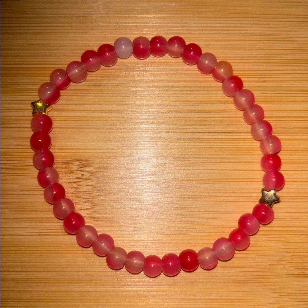 Pink Beaded Bracelet with Star Accents